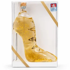 Likér Gold se zlatými šupinkami v láhvi ve tvaru střevíčku